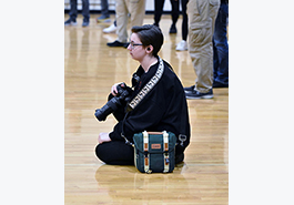  Natalie Garwood on basketball court with camera